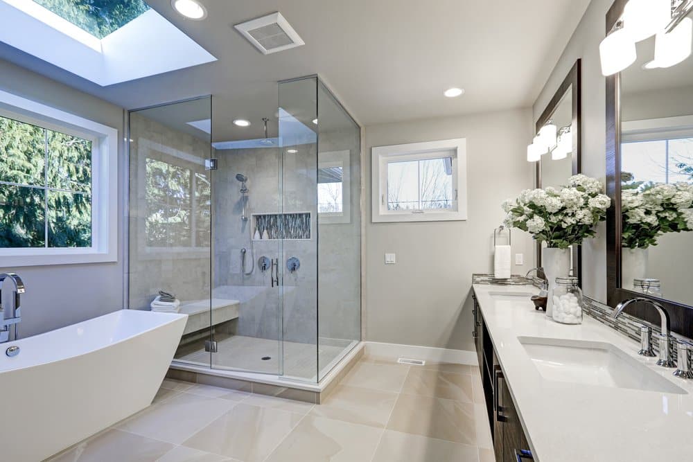 Modern bathroom with recessed ceiling lights providing clean, even illumination