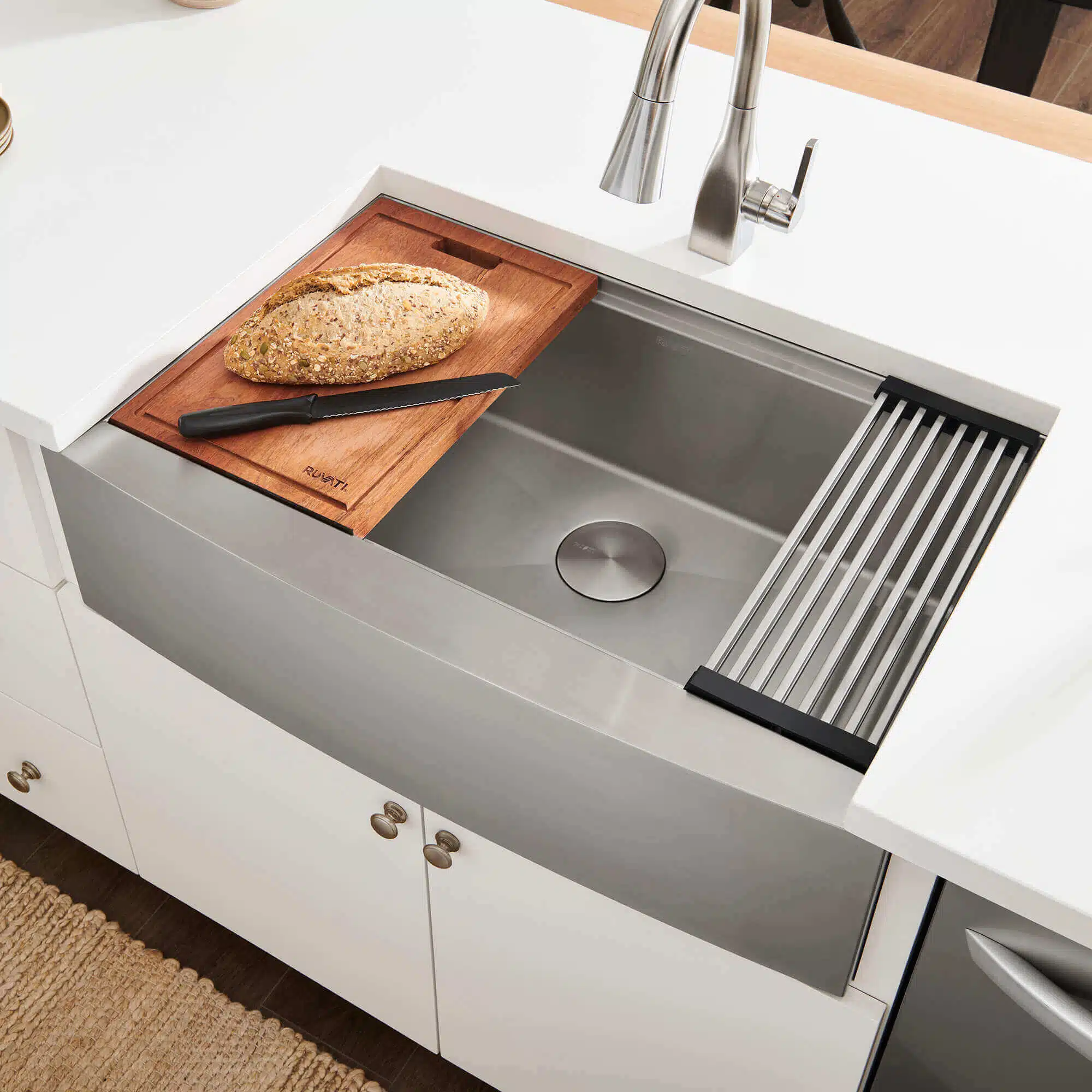 Stainless steel kitchen sink with workstation accessories
