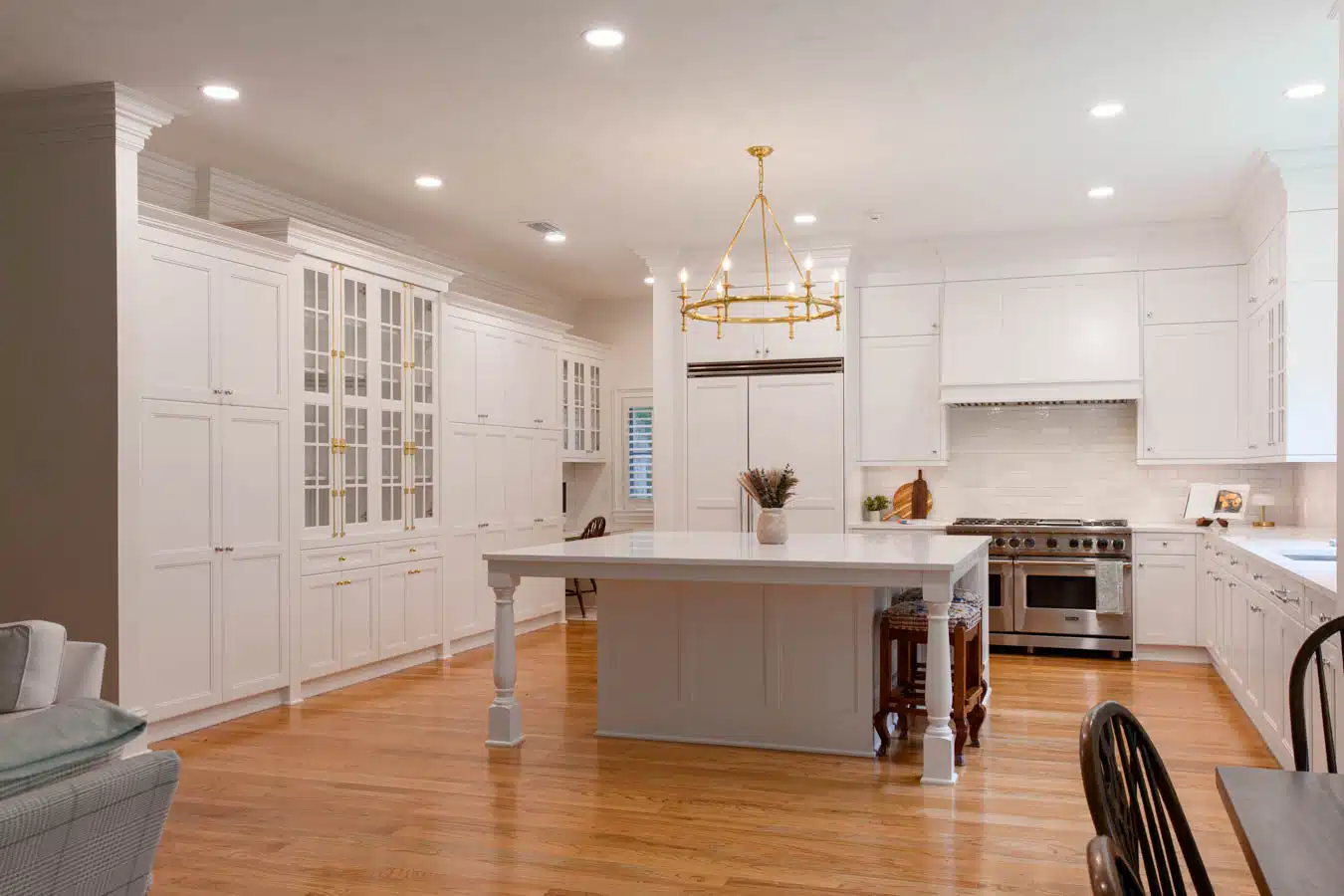 a large kitchen with white cabinets, with the best remodeling contractors in Tallahassee